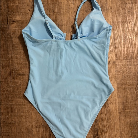 Blue One-Piece Swimsuit with Plunging Neck and High-Leg Cut - Picture 6 of 8